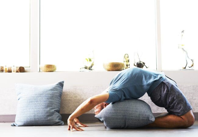 man doing yoga session